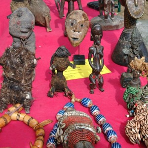 A stand sells African art at the Marché aux Puces de la Porte de Vanves in Paris