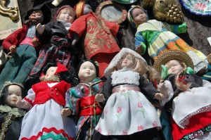 Vendor at the Marché aux Puces de la Porte de Vanves in Paris selling dolls.