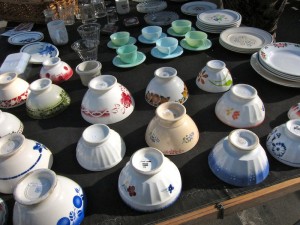 Stand selling tableware at Marché aux Puces de la Porte de Vanves