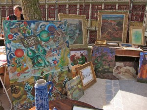 A stand selling art at the Marché aux Puces de la Porte de Vanves in Paris