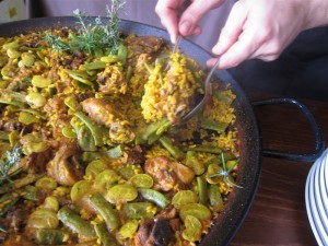 Serving Paella Valenciana by Susan Manlin Katzman
