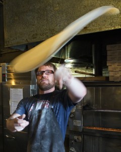 Vinos Brewpub thrown dough by Kat Robinson