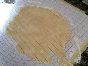 Roll Dough and Cut Into Strips