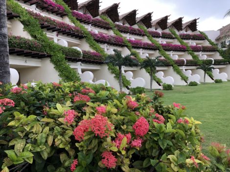 Back view of the flower-filled Grand Velas Riviera Maya resort.