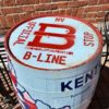 Barrel painted with B-Line Logo