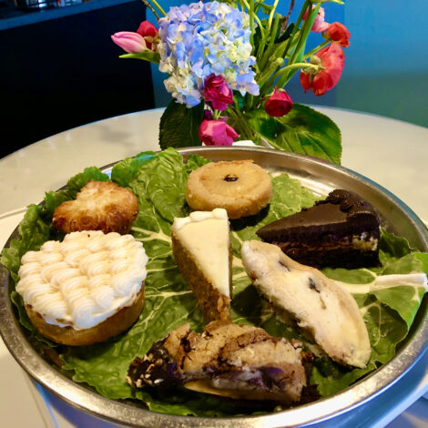 Individual pieces of cake on a tray.