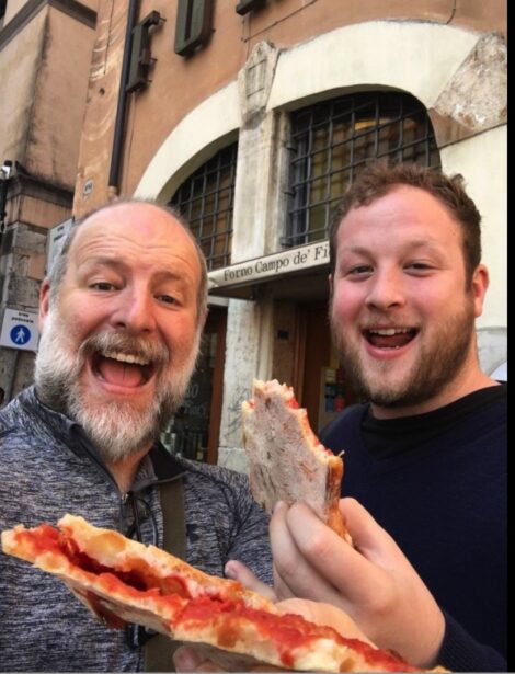 Mark and Matt Katzman eating pizza.