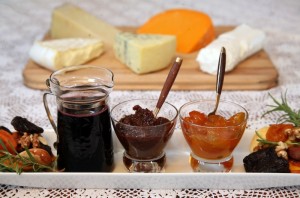 A cheese board with condiments