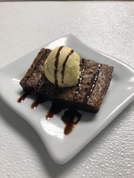 The Goomah Brownie topped with Ice cream and chocolate sauce