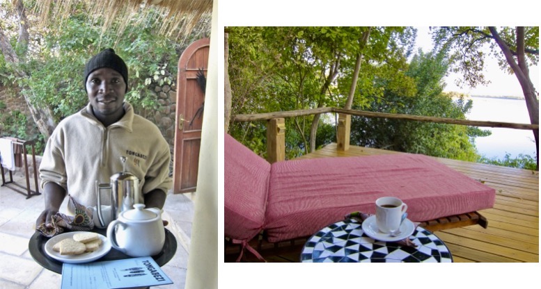 A valet brings wake-up coffee to enjoy on the deck of a room at Tongabezi Lodge