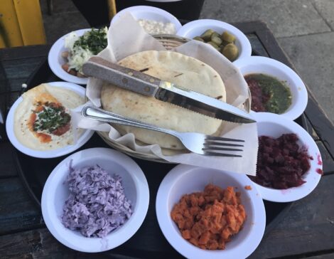 An assortment of side dishes that come with Ta-eem's entrees.