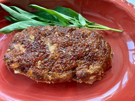 A cooked meatloaf with a sweet bourbon glazed top. 