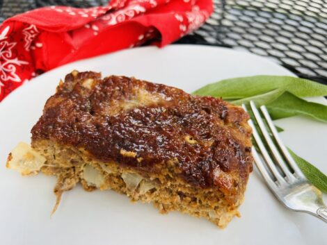 A serving of Bourbon Glazed Meatloaf with fork