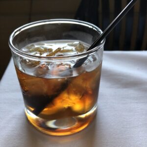 A glass of bourbon.