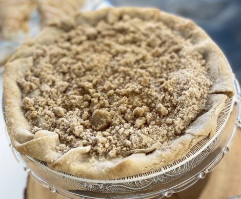 An Apple Crumb pie with casual folded 
